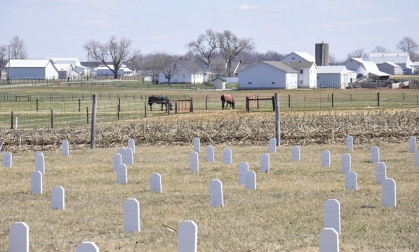 This is a typical Amish cemetery in Allen County, Indiana. Some Amish cememteries use stone  grave-markers, while others use wood.  Dave Shaner photo, used with permission.
