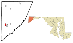 The Amish community is located in the shaded red area near the southern tip of the county, surrounded on 3 sides by West Virginia.