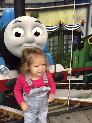 Aster meets Thomas the train at Hara Arena in Dayton