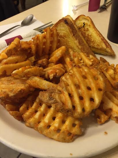 My grilled cheese, dwarfed by a pile of monster-sized waffle fries...It was all very good: crisp fries, perfectly toasted grilled cheese...