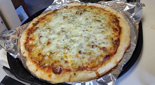Blue ribbon baker, Carmon Hacker,  took a step back into comfort food with this delicious Chef Boyardee pizza (with added cheese and Italian sausage)