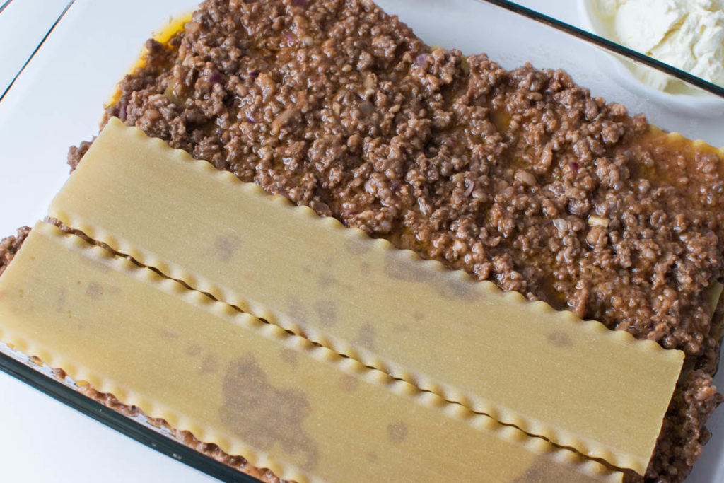 Mother's Cream Cheese Lasagna: Cover with lasagna noodles
