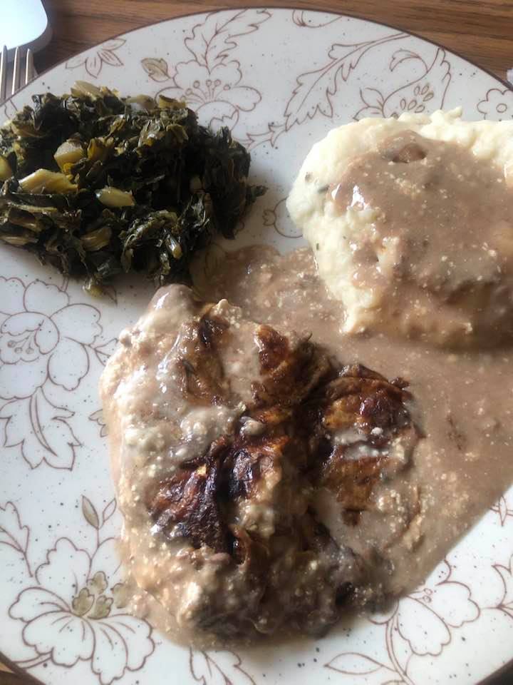 Amish round steak and gravy on a plate